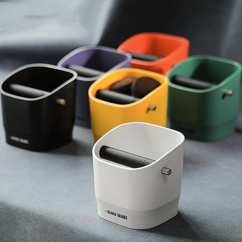 Black, yellow, red, purple, white
Italian coffee knock box for espresso grounds disposal with rubber knock bar and non-slip silicone base.